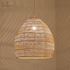 Enhance the ambiance of your dining area with the Madeleine Rattan Cloche Pendant Ceiling Light. Crafted from high-quality rattan, this Asian-inspired single-bulb suspension lighting fixture exudes elegance and adds a touch of rustic charm to any space. Its cloche-shaped design allows the light to diffuse beautifully, creating a warm and inviting atmosphere. Perfect for hanging over a dining table or chen island, this pendant light seamlessly blends functionality with style. The adjustable cord ensures easy installation and allows you to customize the height according to your preference. Whether you're hosting a dinner party or enjoying a family meal, the Madeleine Rattan Cloche Pendant Ceiling Light brings a unique and sophisticated appeal to any room.Size: 14" 18" 20" 23.5" 31.5" 39.5" F Restaurant Ceiling Lights, Lights Over Dining Table, Minimalist Ceiling Light, Rattan Shades, Rattan Lamp, Rattan Pendant, Dome Pendant Lighting, Rattan Pendant Light, Traditional Farmhouse