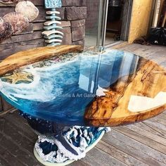 a glass table that has been made to look like a surfboard