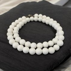 Indulge in the timeless beauty of our natural white coral necklace. Crafted with exquisite 8mm smooth round coral beads, this piece exudes elegance and sophistication. The soft white hue of the coral adds a touch of serenity and grace to any outfit.   Key features: * Natural white coral beads * 8mm Smooth, round shape * Elegant design * High-quality craftsmanship * Soft white color * Calming and balancing properties   Perfect for: * Daily wear * Special occasions * Gift-giving   Order yours toda White Coral Necklace, Soft White Color, Coral Beads Necklace, Handmade Gifts For Her, White Coral, Coral Necklace, Beads Handmade, Coral Beads, Soft White