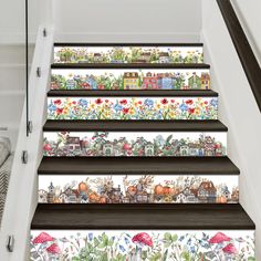 the stairs are painted with colorful flowers and houses on them, as well as an image of