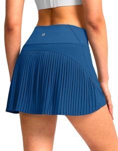 PRICES MAY VARY. Lightweight, Sweat-wicking: Outer layer on this tennis skirt is made of light and breathable fabric, wicks moisture well when sweating, also makes a flowy appearance. Pleated Design & High-rise: Features flattering pleats at back and structured a-line silhouette. Elastic wide waistband provide tummy control which cinches your waist for a slimming and cute look. Soft Built-in Shorts: 5" inseam shorts underneath, long and soft enough to offer a comfortable fit with modest full coverage. Use stretch knit material to stay it in place firmly, do not ride up and not be see-through, prevent to chafe on thighs as you move around. Phone & Ball Pockets: 2 drop-in pockets on the liner are large for phone or any personal items. Also convenient to keep balls for tennis, golf and pickle Casual Blue Stretch Tennis Skirt, Moisture-wicking Solid Color Tennis Skirt For Sports, Blue High-waisted Stretch Tennis Skirt, Solid Moisture-wicking Short Tennis Skirt, Blue Moisture-wicking Tennis Skirt For Sports, Golf Skorts, Athletic Skirts, Athletic Skort, Pleated Tennis Skirt