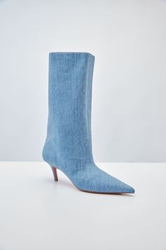 For Spring/Summer 2024, Amina Muaddi played with the idea of trompe l'œil by crafting a pair of thigh-high suede boots with a denim print. Thigh High Suede Boots, Charlotte Chesnais, Denim Print, Craig Green, Scarf Shirt, Shirts For Leggings, Amina Muaddi, Cape Coat, Spring Summer 2024