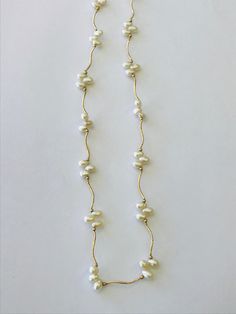 "This is a 14K yellow gold necklace with several pearls. Material(s): 14K yellow gold + pearls Total Weight: 8.4 grams Flaws (if any): None to mention Marking(s): \"585\" translating to 14K gold Measurements: This necklace measures 17 inches in length. If you have any questions about this necklace, please do not hesitate to contact us! ♥" Yellow Gold Baroque Pearl Single Strand Necklace, Vintage Gold Akoya Pearl Necklace, Yellow Gold Pearl Necklace With Gold Beads, Formal Pearl Necklace With Gold Beads, Formal Gold Baroque Pearl Necklace, Pearl Necklace For Anniversary, Formal Gold Pearl Necklace With Gold Beads, Gold Pearl Drop Necklace For Anniversary, Anniversary Gold Pearl Drop Necklace