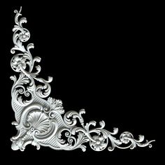 an intricately designed piece of metal on a black background