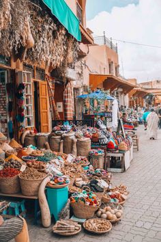 an outdoor market with lots of items for sale