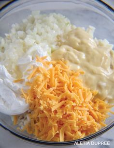 cheese, mashed potatoes and gravy in a glass bowl