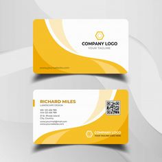 two business cards with yellow and white wavy lines on the front, back and sides