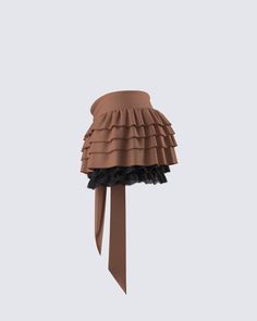 Ruffling some feathers in the sweetest way possible 😌 Embody flirty and fun energy in this black A-line mini skirt complete with five tiers of lace ruffles, a detachable brown ruffle sash, and an elastic waistband 🤎 Elegant Tiered Ruffle Skort, Party Skort With Ruffle Hem And Tiered Skirt, Tiered Skirt Skort With Ruffle Hem For Parties, Tiered Ruffle Mini Skirt For Party, Party Tiered Ruffle Mini Skirt, Party Mini Tiered Skirt With Ruffles, Fitted Brown Tiered Mini Skirt, Party Mini Tiered Ruffle Skirt, Party Skort With Ruffles