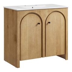 a wooden cabinet with two doors and a sink in the middle, on a white background