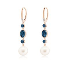 These dangling long earrings in 14k rose gold draw the eyes with their breathtaking beauty. The Freshwater cultured pearls and the round and oval London blue topazes create a striking contrast. Diamond accents embellished on the leverback closures, sparkle endlessly and complete the design. Gold Drawing, Round Dangle Earrings, Freshwater Pearl Earrings, Freshwater Pearls Earrings, Freshwater Cultured Pearls, London Blue Topaz, London Blue, Cultured Pearls, Long Earrings