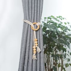 PRICES MAY VARY. ✅Size:The total length of this tassel tie-backs is about 77cm. There is a slight deviation in the measurement. The actual product received is the main product. ✅EXQUISITE MATERIAL:This curtain ties are made of high-quality cotton and wood, using exquisite hand-made techniques. The simple Nordic style is versatile and chic. The wooden ring surface is smooth and delicate, and the boho curtain tie back is not easy to break.The hand-woven rope has fine lines and is not easy to unrav Wood Bead Curtain, Curtain Pull Backs, Magnetic Curtain Tie Backs, Curtain Tie Backs Diy, Rope Curtain Tie Back, Drapery Holdbacks, Outdoor Drapery, Bead Curtain, Patio Door Curtains