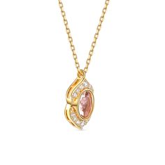 Embrace the enchanting beauty of our morganite necklace and let its timeless elegance captivate your heart. At the center of this captivating necklace is a mesmerizing oval-cut morganite gemstone, radiating a soft and enchanting blush hue. Its elongated shape adds a touch of elegance and creates a sense of movement, capturing the essence of timeless beauty. Above and below the main stone, a delicate row of sparkling white gemstones gracefully accentuates the allure of the morganite. The shimmeri Elegant Rose Gold Crystal Necklace With Round Pendant, Elegant Gold Heart Pendant Crystal Necklace, Elegant Oval Pendant Birthstone Necklace, Exquisite Gold Morganite Jewelry, Pink Oval Cubic Zirconia Necklaces, Pink Oval Cubic Zirconia Necklace, Rose Gold Oval Necklace For Anniversary, Exquisite Oval Pendant Necklace As Gift, Exquisite Oval Pendant Necklace Gift