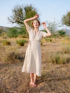 Discover the beauty of simple elegance with our off-white EVELIINA wrap dress from the Native Soil collection. This unique piece is carefully crafted from 100% raw cotton, which is not only eco-friendly but also exceptionally soft. Dress EVELIINA is a compliment to the female figure. Thanks to the wrapping technique, it fits a wide variety of body shapes and you can tie the ribbon to the left or right as you need it. The three-quarter length is ideal for different body sizes and is extremely adv White Summer Dress Boho, Different Body Sizes, Long Cotton Dress, Summer Dress Boho, White Wrap Dress, White Summer Dress, Cotton Long Dress, Mode Boho, Boho Summer Dresses