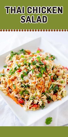 thai chicken salad on a white plate with green garnish