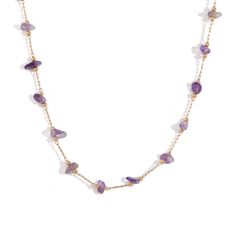 This quirky and playful bohemian style necklace features stunning gemstone beads. Collect and layer them for a unique and stylish look. Embrace your inner boho chic with this one-of-a-kind piece! DETAILS & SIZE Finish: 18K gold plate Material: Stainless Steel, Amethyst, Faux Turquoise, Faux Pearls, Quartz Measurements: Beads: approx. 6mm; Chain: 16" + 2" extension Lobster Claw clasp Waterproof, tarnish-resistant, and nickel free Shop Necklaces for more options to layer with this! Bohemian Gemstone Beaded Necklaces For Layering, Bohemian Gemstone Beads Necklace For Layering, Bohemian Crystal Necklaces With Natural Stones For Layering, Bohemian Double Strand Crystal Necklaces With Gemstone Beads, Bohemian Multi-strand Crystal Necklace With Gemstone Beads, Bohemian Gold Beaded Necklaces With Gemstone Beads, Gold Beaded Necklaces With Natural Stones For Festivals, Bohemian Gemstone Crystal Necklaces For Layering, Bohemian Gold Beaded Necklace With Gemstone Beads