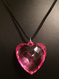 18in. Flat black velvet necklace with heart pendant. Solid acrylic hearts come in 2 colors: Pink or Red. 1 of each color is available. Heart is approx. 2in x 1 1/2in x 1/4in (depth). With 2in silver chain extender. Medium weight. Scene Accessories, Velvet Necklace, Necklace With Heart, Hand Necklace, Cloud Shapes, Chain Extenders, Gems Jewelry, Valentine Heart