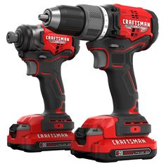 two red and black cordless drillers with one being held up by the other