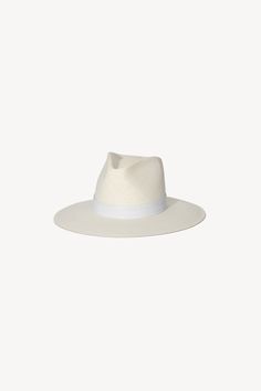 A classic fedora style made with packable straw. The structured fit creates a beautiful modern shape while staying true to the timeless design of our classic fedora. | Spring Summer 2021 Collection by Janessa Leoné. Women Fedora, Packable Hat, Lounge Sweater, Janessa Leone, Easy Tiger, Surf Shop, South Of France, Leather Band, Straw Hat