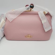 Brand: Coach Style: Nora Kisslock / C1451 Condition: New With Tag; Comes In Original Packaging Exterior Color: Carnation Interior Features: Interior Multifunction Pocket Closure: Kisslock Hardware Color: Gold Straps: One Crossbody/Shoulder Strap Approx. Measurements: 8.5" L X 5.5" H X 3" W Includes: Coach Hangtag No Lowball Offers Or Trades Please. Thank You For Looking! School Satchel, Lv Damier, Carnation Pink, Keds Champion, Small Business Planner, Bags Coach, Fancy Bags, Business Planner, Cute Bags