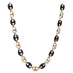 14K yellow gold and onyx necklace with alternating gold and onyx anchor links. Tongue closure with figure eight safety. Measures 3/8 inches wide and 29 inches long. Gold Link Necklace, Gold Slides, Cuban Link Necklace, 14k Yellow Gold Necklace, Heavy Chain, Gold Link Chain, Solid Gold Necklace, Onyx Necklace, Necklace Craft