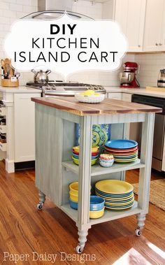 a kitchen island with plates stacked on it and the words diy kitchen island cart above it