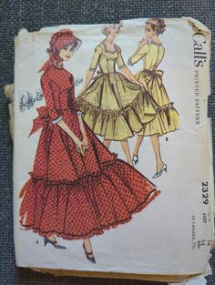 McCall's 2329; ©1959; Misses Centennial and Square Dance Costume with Sunbonnet. Centennial and square dance costume w/ sunbonnet. Dress or ankle length gown with fitted bodice. Choose height or low, shaped neckline. Short or three quarter sleeves. Full, gathered skirt with wide ruffled bottom tier. Back button or zipper closure. Size 14  Bust 34 Waist 26 Hip 36 Back Waist Length 16 1/4  Pattern: cut complete, cut with pinking shears, complete with sewing guide Envelope: completely split open, rip along the back from bottom left corner, small rip starting from middle right side  All Patterns are stored in 3 ml polypropylene archival quality comic book sleeves with 24pt, acid free, archival quality board Keep in mind in with vintage patterns that in the 1940s & '50s, a 34-inch bust was cons Square Dance Dress, Vintage Clothes Patterns, Square Dance Dresses, Square Dance, Vintage Dress Patterns, Square Dancing, Costume Patterns, Mccalls Patterns, Prairie Dress