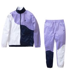 Buy Men's Staple Pigeon Nassau Nylon Tracksuit Set in Purple - Swaggerlikeme.com Casual Nylon Tracksuit For Streetwear, Sporty Tracksuit For Spring Streetwear, Sporty Patchwork Track Jacket For Spring, Casual Nylon Windbreaker For Training, Casual Spring Training Track Jacket, Nylon Color Block Windbreaker In Athleisure Style, Color Block Nylon Windbreaker Athleisure, Nylon Color Block Athleisure Windbreaker, Sporty Purple Nylon Windbreaker