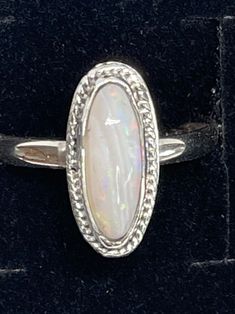 Stunning Opal ring size 9 in .999 fine silver and .925 sterling silver. October birthstone Oval Sterling Silver Jewelry Stamped 925, Fine Jewelry Sterling Silver Oval Opal Ring, Adjustable White Gold Opal Birthstone Ring, Classic Oval Jewelry Stamped 925, Spiritual Sterling Silver Crystal Ring For Formal Events, Spiritual Sterling Silver Crystal Ring For Formal Occasions, Oval Stackable Rings In White Gold And Sterling Silver, Sterling Silver Spiritual Opal Ring, Spiritual Sterling Silver Opal Ring Birthstone