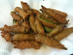 some fried food is sitting on a napkin