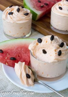 watermelon desserts with whipped cream and chocolate chips on top are ready to be eaten