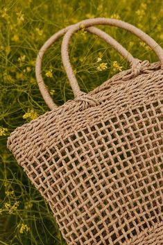 THIS SALE ITEM IS FINAL SALE! Calling all the beach babes. We introduce you to the Stop and Smell the Roses Bag. This straw bag in perfect for keeping your beach essentials at your side. This bag has should straps, a braided twine material and a waterproof feature. Width: 13 1/2" Length: 12 1/2" Stop and Smell the Roses Bag-Khaki, boutique clothing, casual, the perfect bag! Boutique Clothing Braided Tote Bags For Beach Season, Beach Bag With Braided Details In Beige, Beige Braided Bags For The Beach, Beige Braided Bag For The Beach, Trendy Braided Bag For Vacation, Eco-friendly Braided Vacation Bags, Braided Shoulder Bag For Vacation, Beachy Bucket Bag With Braided Handles, Braided Bags For Beach Season