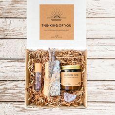 Free Shipping on Gift Boxes 🖤Our relaxation meditation box is the perfect gift for anyone needing a little self care! It includes our RELAX + CALM essential oil roller infused with amethyst crystals and a blend of lavender and frankincense essential oils in a base of fractionated coconut oil. Next we include our WHITE SAGE CLEANSING BUNDLE full of all the meditation necessities to clear your space. Sage, Palo Santo, Crystal quartz, Selenite and Lavender. A medium size AMETHYST CLUSTER is included in this box, amethyst relieves stress while working with your crown chakra to clear out blockage and allow for better rest, relaxation and sleep. Keep it close, meditate with it and allow its energy vibrations to balance your aura. Last but not least, we include our best selling 4oz soy candle i Handmade Lavender Crystal Bracelet Gift, Handmade Lavender Crystals As A Gift, Calm Essential Oil, Bohemian Purple Crystals For Gift, Lavender Raw Stone Crystals For Gift, Chakra Gift Box Ideas, Sage Cleansing, Calming Essential Oils, Oil Roller