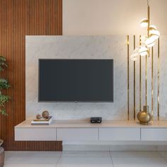 35 TV Wall Design Ideas for a Modern Luxury Living Room – Transform Your Space with Style Tv Wall Makeover, Tv Wall Design Luxury, Tv Wall Design Ideas, Modern Luxury Living Room, Living Room Stands, Wall Design Ideas, Pooja Room Door Design, Room Door Design