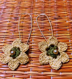 Small  Elegant Crochet floral earrings Can wear them for casual and party wear  I have made them myself with love and affection  Please note the size and color might vary from the actual picture Elegant Flower Shaped Earrings For Beach, Elegant Brown Flower Earrings For Gift, Elegant Flower-shaped Earrings For Beach, Elegant Flower-shaped Beach Earrings, Handmade Festive Flower Earrings, Festive Handmade Flower Earrings, Gold Flower-shaped Earrings For Beach, Handmade Bohemian Flower Earrings For Party, Handmade Flower Earrings In Gold For Summer