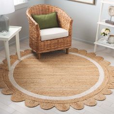 a wicker chair sitting on top of a rug