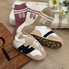 Just like your favorite NB Shoes, but for your baby. Super cute & super comfy. Designed to keep your baby looking trendy! Sizing: 0-6mo total length of shoe is 11cm 6-9mo total length of shoe is 12cm 9-12 mo total length of shoe in 13cm Includes: 1x Pair of Shoes 3x Pair of Socks Baby Shoe Collection, Baby Shoes Macy's, Infant Tennis Shoes, Crib Shoe, Nb Shoes, Trendy Baby Shoes, Matching Socks, Baby Sneakers, Crib Shoes