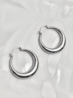 These gorgeous half moon earrings are made for the brightest and boldest. They are perfect for everyday wear or will complete your look for the holidays. They are able to make any style more lively and visible. These earrings are plated in solide 925 sterling silver✨ Size: Diameter is 40 mm / 1,57 in Weight: 10g (the weight of an earring is 5g) 💌DELIVERY * Orders are processed and delivered to the post office within a maximum of 48 hours after payment has been validated by the ETSY platform (ex Semi-circle Metal Hoop Earrings, Silver Crescent Minimalist Hoop Earrings, Minimalist Crescent Hoop Earrings, Trendy Crescent Earrings For Pierced Ears, Trendy Round Earrings With Polished Finish, Trendy Small Hoop Earrings In White Gold, Trendy Silver Hoop Earrings For Pierced Ears, Tarnish Resistant Crescent Hoop Earrings, Trendy White Gold Hoop Earrings