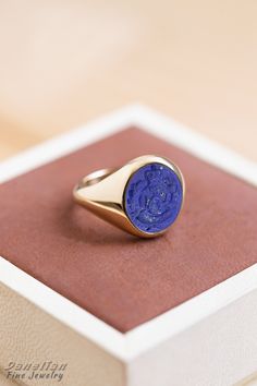 ✪ Lapis Custom Engraved Gemstone Family Crest Signet Ring - Personalized Coat of Arms - Danelian Jewellery Workshop ✪ Danelian Jewellery with fine goldsmiths craftsmanship creates custom designs based on our client requests. Gold rings made with personalized specifications, your family crest, coat of arms, logo or any design imagined. ➤ Large variety of gemstones to create, with personalized engraving. ✔ Feeling inspired? Leave us your message to discuss now and see any bespoke jewelry brought t Symbolic Carved Ring, Symbolic Carved Round Ring, Formal Round Carved Engraved Ring, Round Carved Engraved Ring For Formal Occasions, Carved 14k Gold Signet Ring For Anniversary, Intaglio Signet Ring As A Gift, Intaglio Signet Ring Gift, 14k Gold Engraved Ring With Intaglio As Gift, 14k Gold Intaglio Engraved Ring As Gift