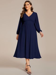 Step into any wedding celebration with confidence in our Plus Size Flowy Long Sleeves V-Neck Midi Chiffon Wedding Guest Dress. The airy chiffon fabric drapes beautifully around your curves, offering a flattering and effortless look. With its versatile midi length and long sleeves, this dress fits perfectly into any evening affair. Whether it's a grand ballroom reception or an intimate candlelit dinner, you'll feel like the belle of the ball, radiating elegance and charm in this captivating ensem Elegant V-neck Chiffon Wedding Dress, Spring Wedding Chiffon V-neck Dress, Chiffon V-neck Dress For Wedding, Elegant Flowy V-neck Bridesmaid Dress, Flowy V-neck Bridesmaid Dress For Formal Occasions, Flowy V-neck Bridesmaid Dress For Wedding Guests, Solid Color Chiffon Empire Waist Dress, Chiffon Dress For Wedding, Flowy Chiffon V-neck Dress For Wedding Guests