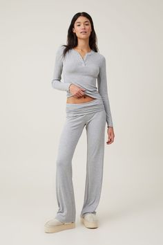 Sleep Recovery Henley Long Sleeve Fitted Long Sleeve Henley For Spring, Fitted Long Sleeve Spring Henley, Fitted Casual Henley With Button Closure, Stretch Tops With Button Closure For Loungewear, Stretch Long Sleeve Tops With Button Closure, Versatile Long Sleeve Tops With Buttons, Versatile Long Sleeve Buttoned Tops, Fitted Long Sleeve Loungewear Top, Casual Long Sleeve Sleepwear With Button Closure