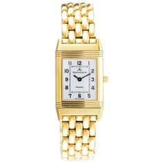 This yellow gold Reverso Watch has an argentè dial with blued steel hands. A yellow gold bracelet is accompanied by a double deployant clasp, also in yellow gold. The piece is fitted with sapphire glass and a manual winding movement. The watch is a new old stock and comes with original box and international warranty. Reference number is Q260.11.10 Caliber number is 846 With its inimitable design and manual winding mechanical movement, the Reverso from Jaeger le Coultre is a milestone of horology Timeless Yellow Gold Watch With Jubilee Bracelet, Classic Yellow Gold Jubilee Bracelet Watch Accessories, Formal Yellow Gold Jubilee Bracelet Watch Accessory, Classic Watch With Jubilee Bracelet And Rectangular Dial, Reverso Watch, Jaeger Lecoultre Reverso, Lady Watch, Jaeger Lecoultre, Womens Watches Luxury