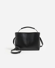 Hedda Midi Handbag Leather Black – Flattered Modern Flap Bag With Top Carry Handle For On-the-go, Modern Top Handle Box Bag For On-the-go, Classic Top Handle Box Bag For On-the-go, Modern Double Handle Satchel For On-the-go, Modern Box Bag For On-the-go, On-the-go Tote Shoulder Bag With Top Carry Handle, On-the-go Box Bag With Detachable Double Handle, Classic Bags With Detachable Strap For On-the-go, Rectangular Flap Bag With Top Carry Handle For On-the-go