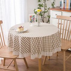 a dining room table with a cake on it