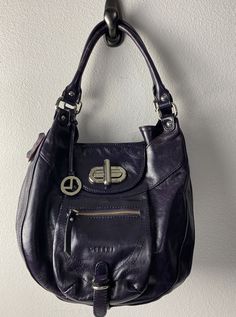 L. credi women faux leather shoulder bag handbags purple. Condition is Pre- owned. Visible scuff throughout leather and straps as shown in the picture. Shipped with USPS priority mail. Purple Leather Handbag, Purple Shoulder Bag For Office, Purple Top Handle Shoulder Bag For Office, Purple Leather Shoulder Bag With Zipper Closure, Soft Leather Purple Shoulder Bag, Purple Hobo Bag For Shopping, Purple Soft Leather Shoulder Bag, Purple Shoulder Bag With Double Handle And Zipper Closure, Purple Satchel Shoulder Bag For Office