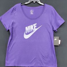 Nwt Bin A.Rn S Nike Purple Crew Neck T-shirt, Purple Nike Sporty Top, Nike Purple Tops For Spring, Nike Purple Sporty Tops, Nike Sporty Purple Top, Basic Purple Tops With Graphic Print, Purple Short Sleeve Top With Logo Print, Nike Shirts Women's, New Orleans Saints Shirts