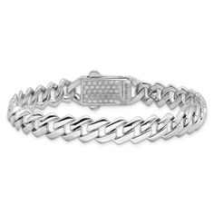 Rhodium over sterling silver Monaco link chain bracelet with cubic zirconia stones and polished finish. Measures approximately 7 1/2"L x 5/16"W. Completes with box catch clasp. Elegant White Gold Diamond Bracelet With Curb Chain, Classic Chain Bracelet With Cubic Zirconia, Elegant Silver Cuban Link Diamond Bracelet, Silver Diamond Bracelet With Solid Link Construction, Silver Cuban Link Bracelet With Cubic Zirconia, Silver Elegant Cuban Link Bracelet With Cubic Zirconia, White Gold Cubic Zirconia Chain Link Bracelet, White Gold Cubic Zirconia Link Chain Bracelet, Silver Cuban Link Tennis Bracelet For Formal Occasions