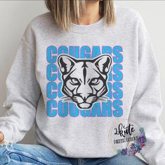 Pick yourself up one of these fun and spirit-filled cougars spirit sweatshirts. This crewneck is sure to impress your friends and make them want one for themselves.  Soft unisex sweatshirt- midweight. 50% polyester and 50% cotton. To get the best wear from your shirt make sure to  1. Wash in cold water 2. Tumble dry low 3. Do not iron on design area 4. Do not use fabric softener  unisex sizing. This design is in a soft, faded Carolina blue with a pink stroke.  The designs on these sweatshirts ar Cougars Spirit Shirts, School Spirit Shirts Cougars, Spirit Wear Designs High Schools, School Sweatshirts Designs, Spirit Wear Ideas, Spirit Wear Designs, Sweatshirt Design Ideas, Cougars Football, School Spirit Shirts Designs