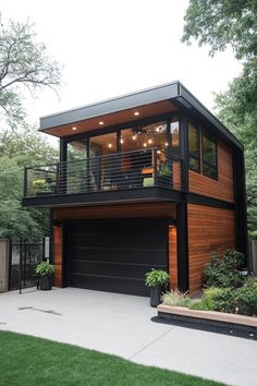 a modern house with an attached deck and garage