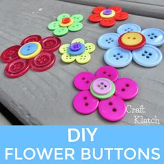 some buttons are laying on a table with the words diy flower buttons in front of them