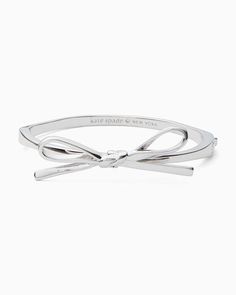 Skinny Mini Bow Bangle | Kate Spade Outlet Wishlist Collage, Kate Spade Bow Bracelet, Bracelets To Make, Pink Heart Necklace, Silver Jewlery, Kate Spade Outlet, Mini Bow, Bow Bracelet, Jewelry Accessories Ideas